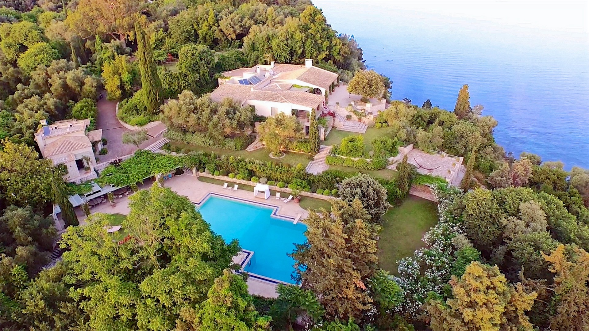 Aerial view of the villa, pool and gardens above the Ionian Sea, Villa Sylva