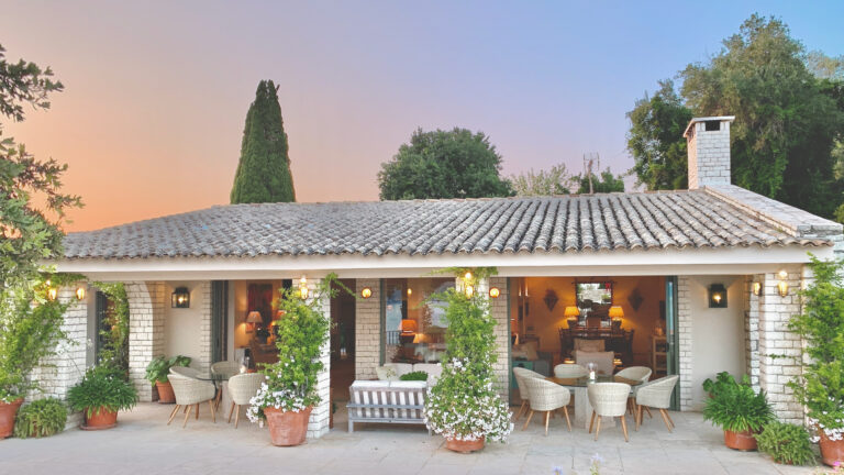 Garden pavilion lit at dusk, Villa Sylva
