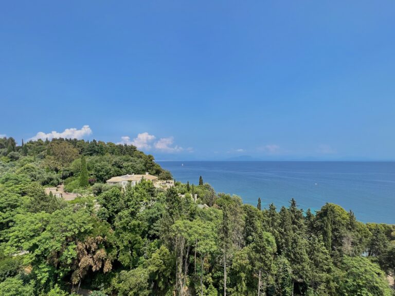 Wooded coastline above the sea, Villa Sylva
