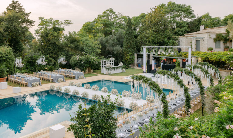 Wedding tables laid beside the pool, Villa Sylva