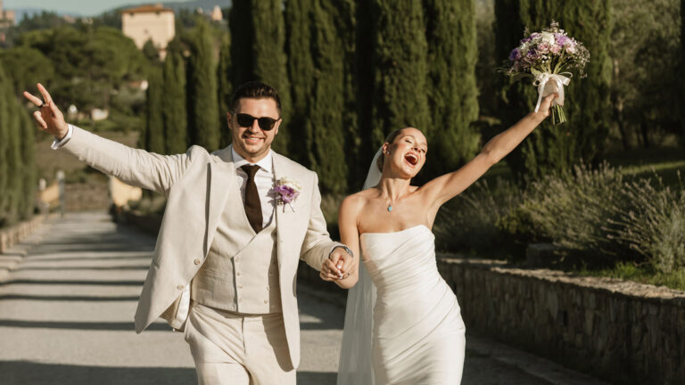 A newly married couple celebrating, Villa Tolomei Hotel