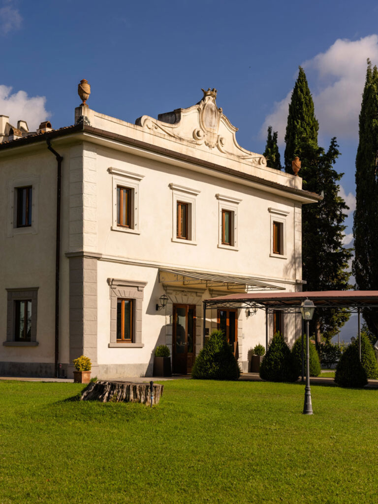 The villa facade and lawn, Villa Tolomei Hotel