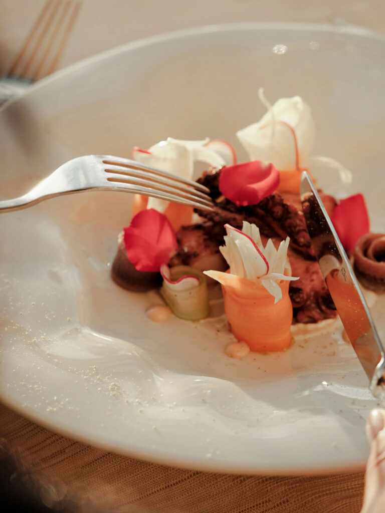 A plated dessert with fruit, Villa Tolomei Hotel