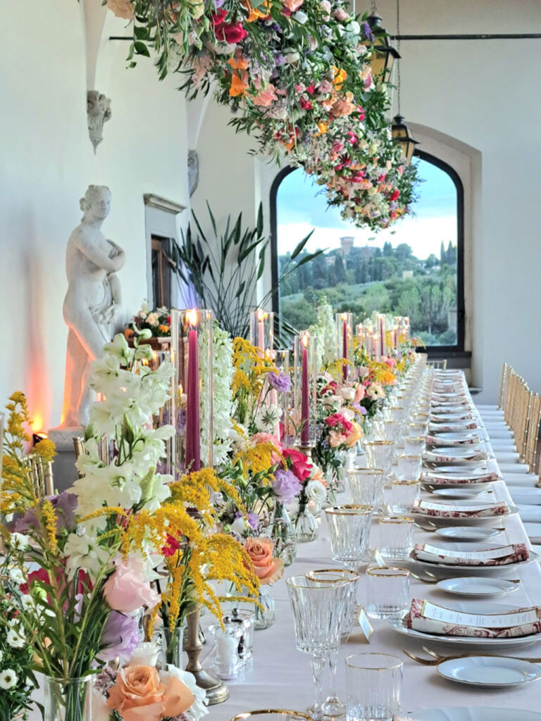A long wedding table in the loggia, Villa Tolomei Hotel