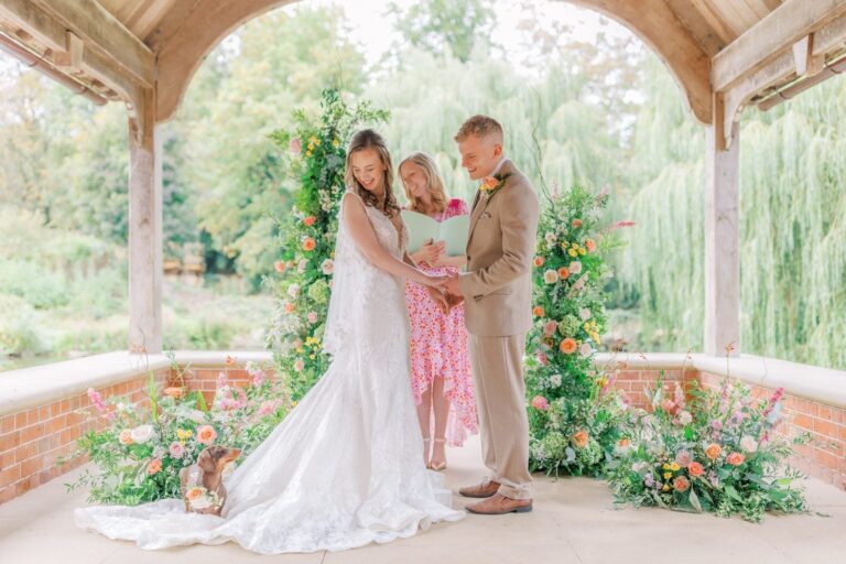 A couple beneath the floral willow arch, Waddesdon Manor