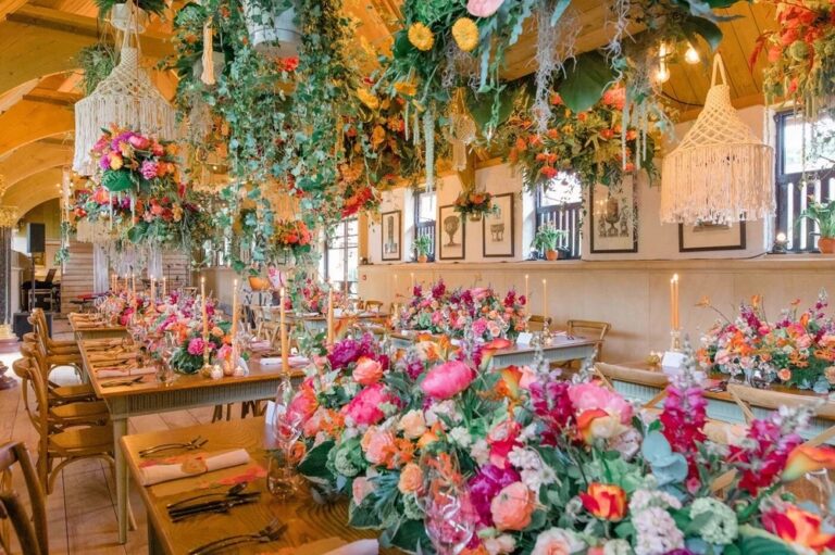A colourful wedding feast beneath the flowers, Waddesdon Manor