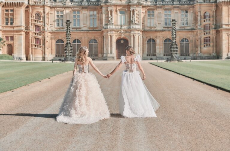 A couple before the Rothschild château, Waddesdon Manor