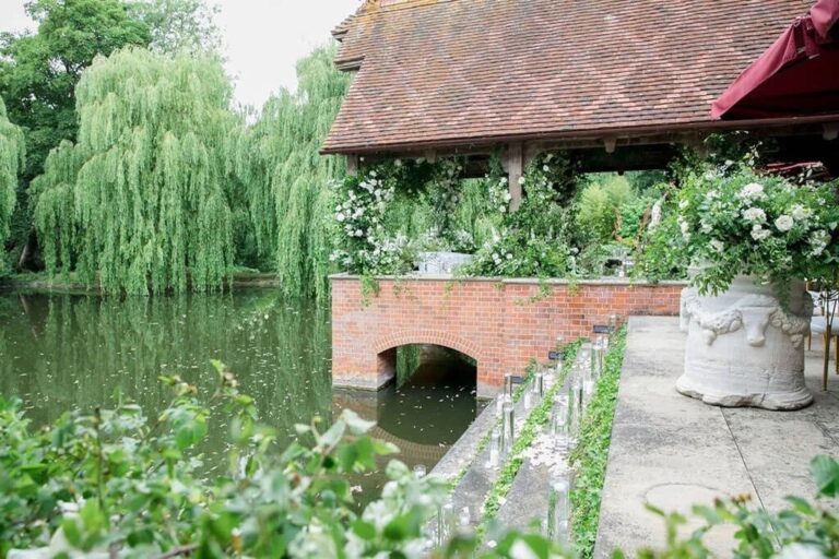 The Dairy on its lake, dressed with florals, Waddesdon Manor