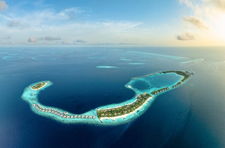 Aerial view of an island chain and lagoon in the atoll, Waldorf Astoria Maldives Ithaafushi