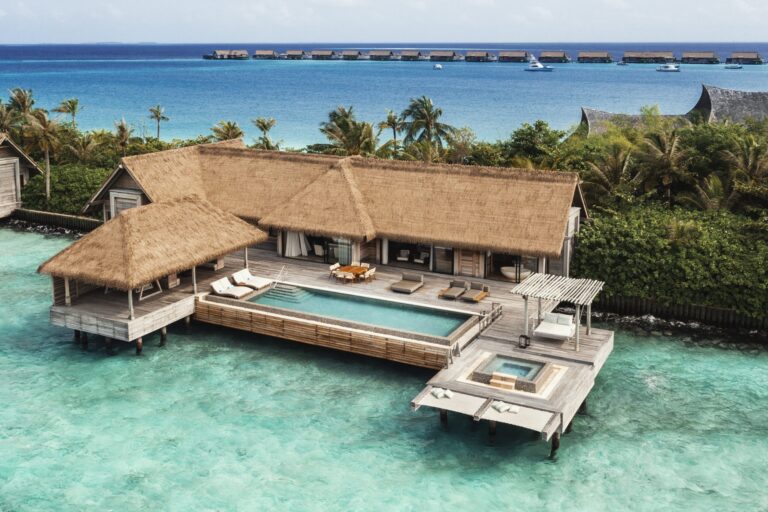 A reef villa with a pool and a deck over the water, Waldorf Astoria Maldives Ithaafushi