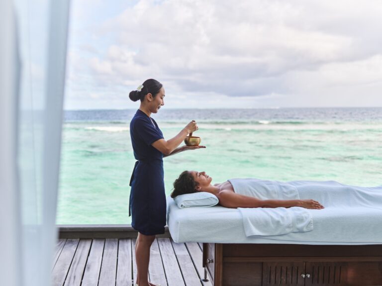A massage on an overwater deck, Waldorf Astoria Maldives Ithaafushi