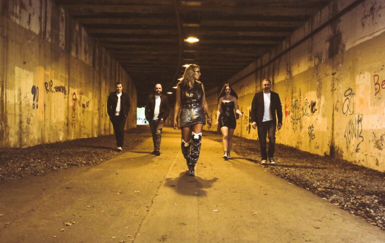The band walking through a tunnel, Waterfront
