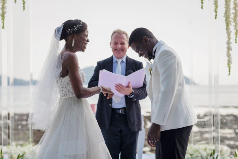 Ring exchange at a seafront ceremony at Thavorn Beach Village, Phuket, Wedding Celebrant Phuket - Paul Cunliffe