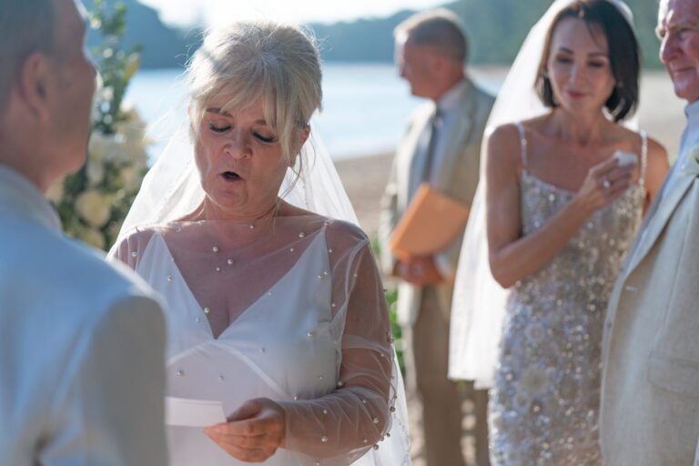 Beach vow renewal under a floral ring arch, Phuket, Wedding Celebrant Phuket - Paul Cunliffe