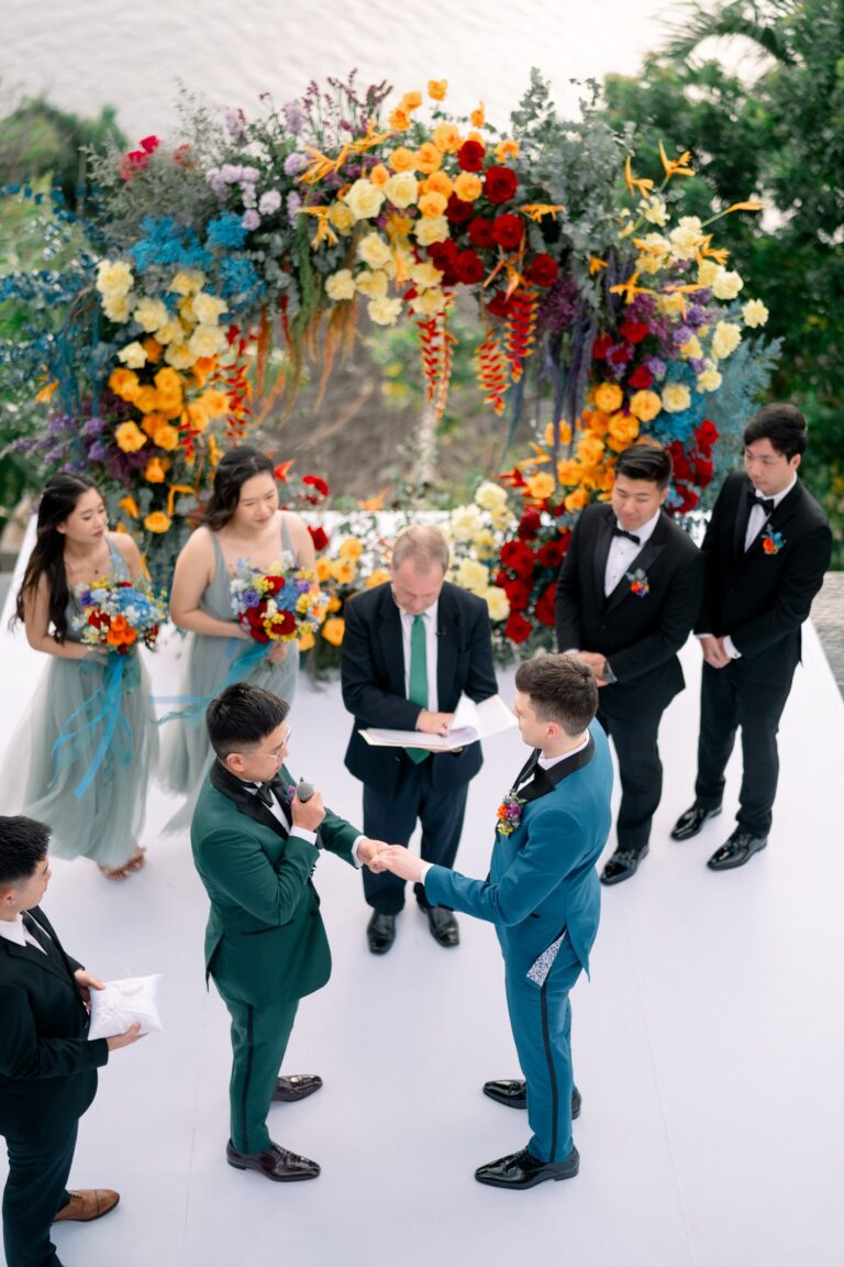 Ceremony beneath a multicoloured floral arch at Villa Baan Santisuk, seen from above, Wedding Celebrant Phuket - Paul Cunliffe