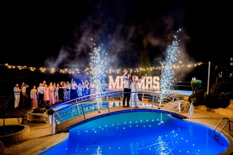 Guests watching sparklers by the pool at Villa Panorama, Wedding Cyprus Villas