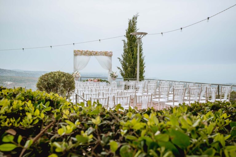 A white ceremony canopy and aisle on the deck at Villa Panorama, Wedding Cyprus Villas