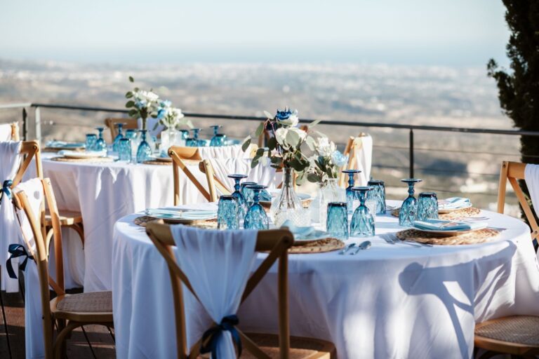 A table setting with blue glassware above the valley, Wedding Cyprus Villas