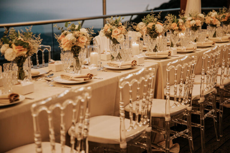 A reception table laid with glassware and flowers, Wedding Cyprus Villas
