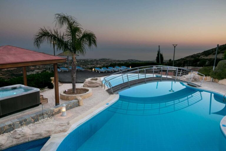 The pool and hot tub at Villa Panorama at sunset, Wedding Cyprus Villas
