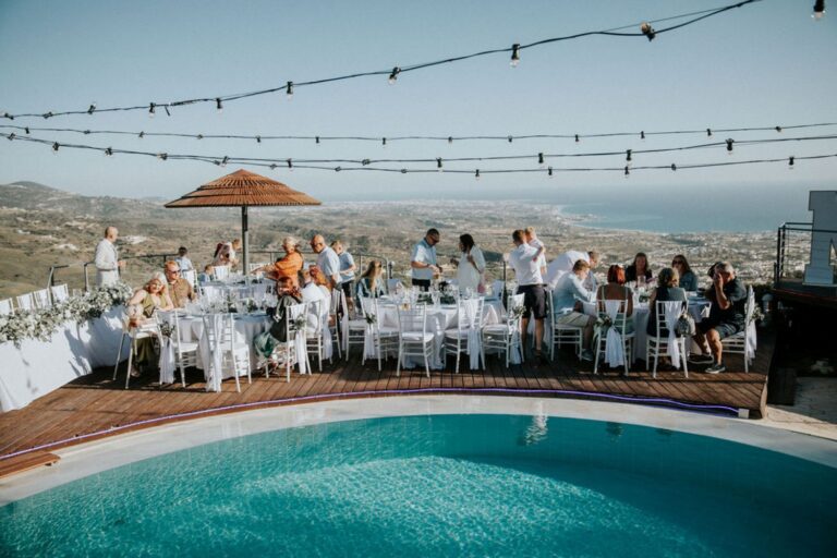 Dinner tables on the deck above the pool at Villa Panorama, Wedding Cyprus Villas
