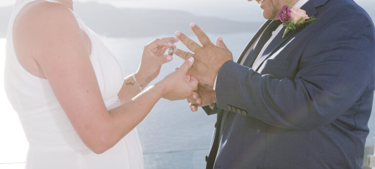 The couple exchange rings during the ceremony, Wedding in Greece