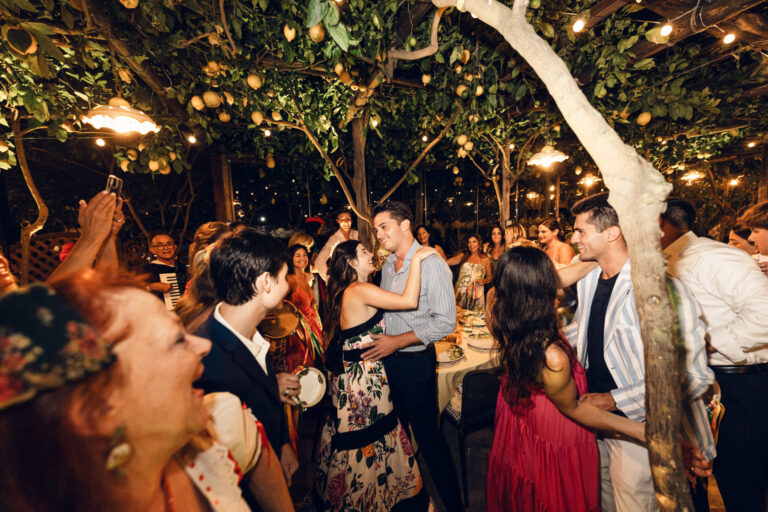 An evening reception under a lemon pergola strung with bulbs, Capri, Weddings Amalfi