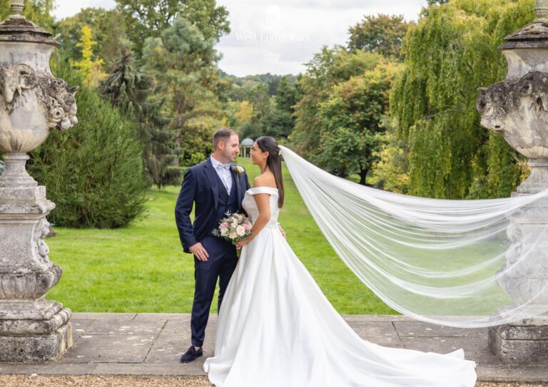 A bride on the terrace above the lawn, West Lodge Park