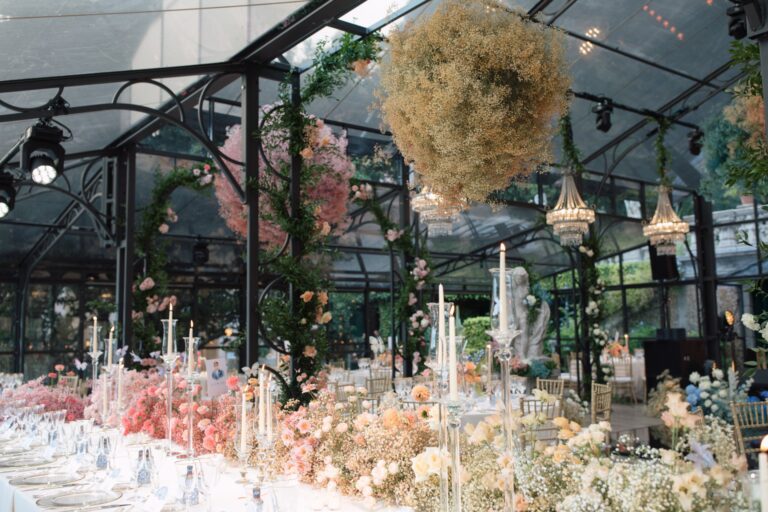 A reception beneath a hanging cloud of gypsophila and pastel garden roses, White Emotion