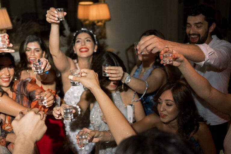 A blindfolded tequila-shot toast among the bridal party, Tuscany, White Emotion