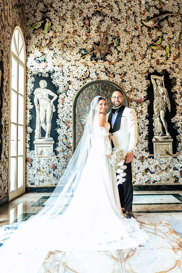 A couple beneath a frescoed ceiling of birds and classical statuary, Rome, White Emotion