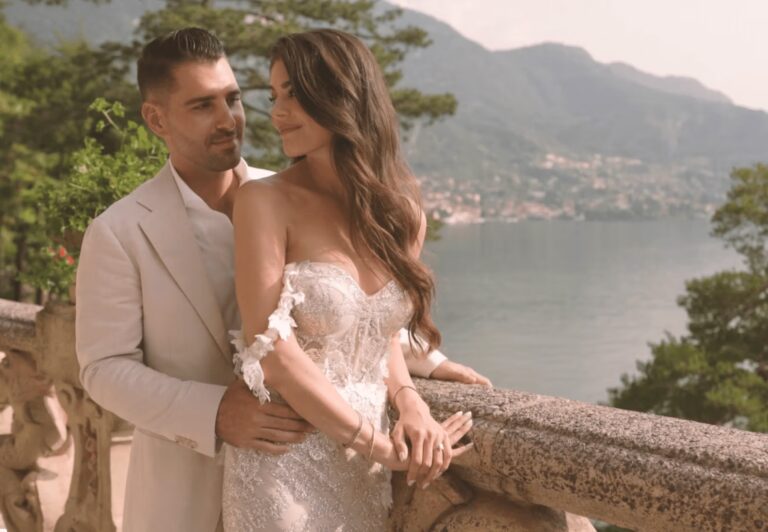 Amanda and Jason on a villa balustrade above Lake Como on their elopement day (film still), Whitesfilm Wedding Videography