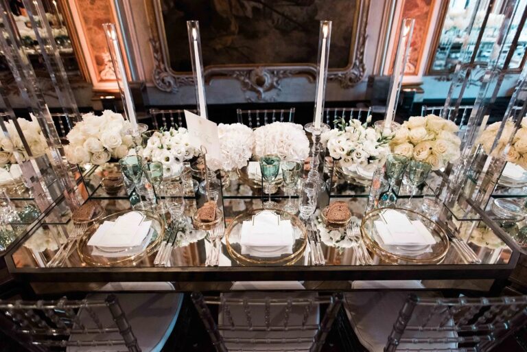 Mirrored dinner tables with white flowers at Aman Venice, Whitesfilm Wedding Videography