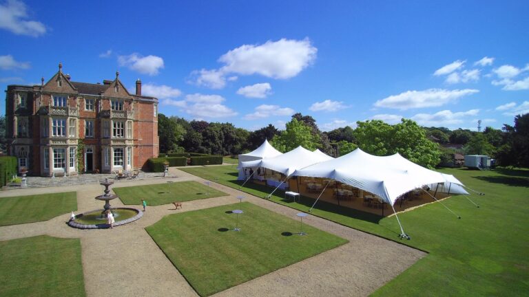 A stretch tent on the lawn beside the house, with the fountain and parterre in front, Wickham House