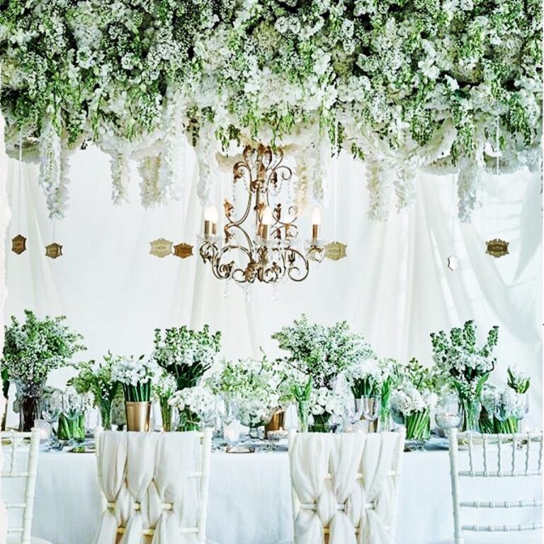 Wisteria dressed overhead, a candlelit reception, Wildabout