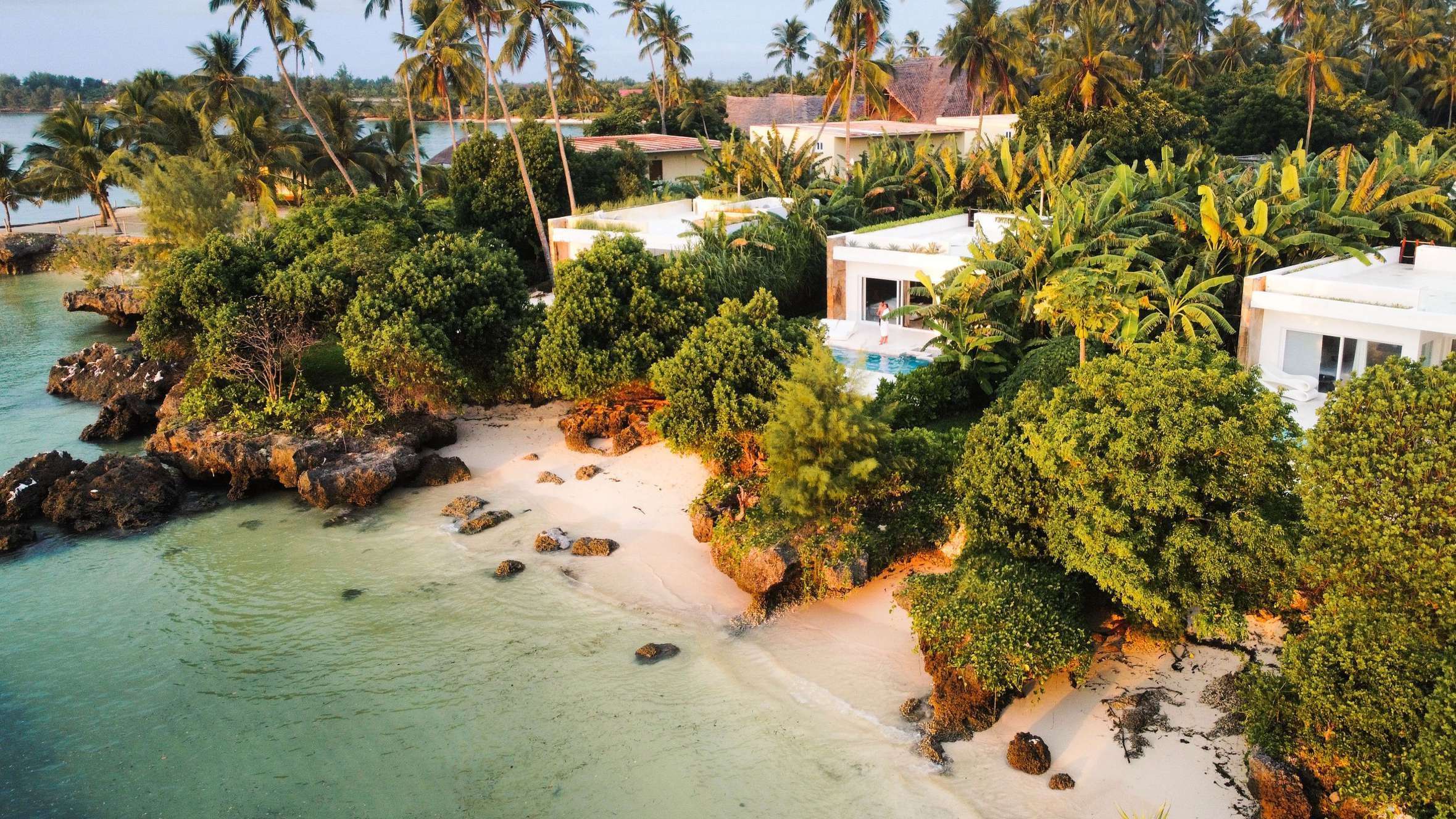 Villas on the rocky shore beside the beach, Ycona Luxury Resort