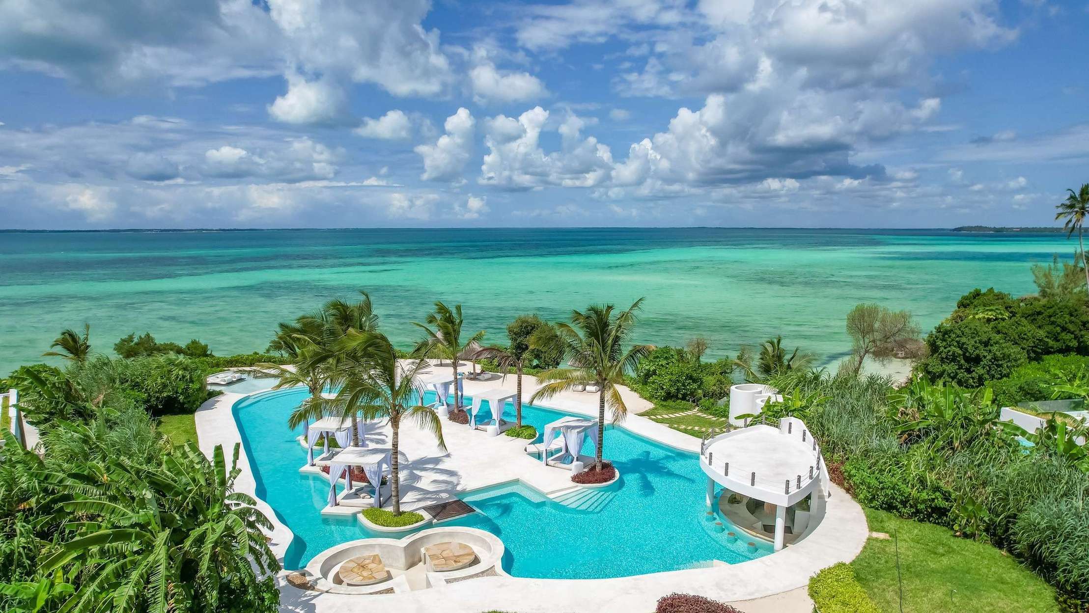 The beach and pool lounge above the turquoise Indian Ocean, Ycona Luxury Resort