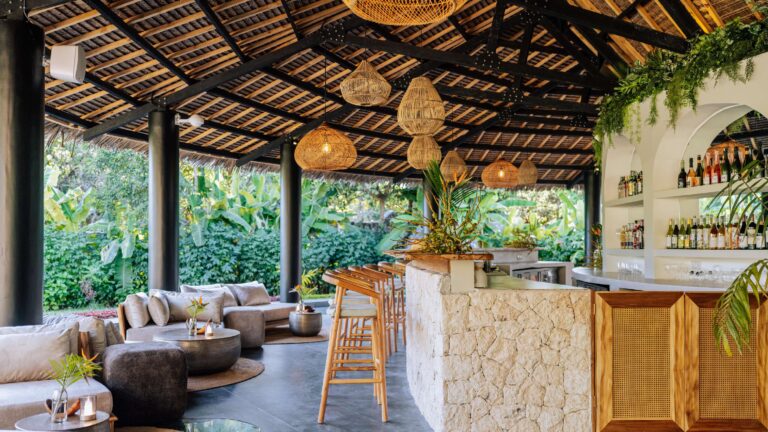 Open-sided restaurant and bar under a thatched roof, Ycona Luxury Resort