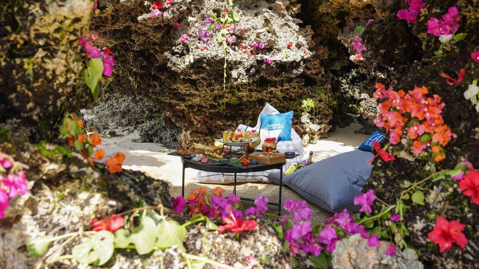 Private dining set in a coral cave