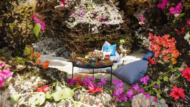 Private dining set in a coral cave, Ycona Luxury Resort