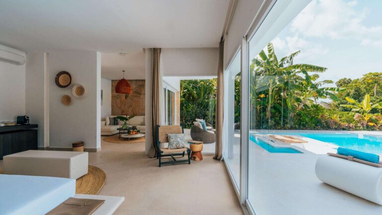 Villa living area opening onto the private pool, Ycona Luxury Resort