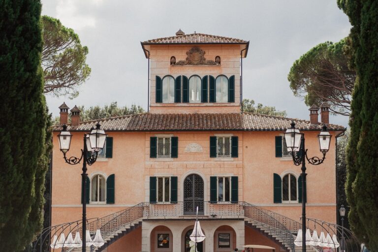 The pale terracotta facade of Villa Valentini Bonaparte, cypress-lined and shuttered, on the Tuscany/Umbria border, Your Secret Tuscany