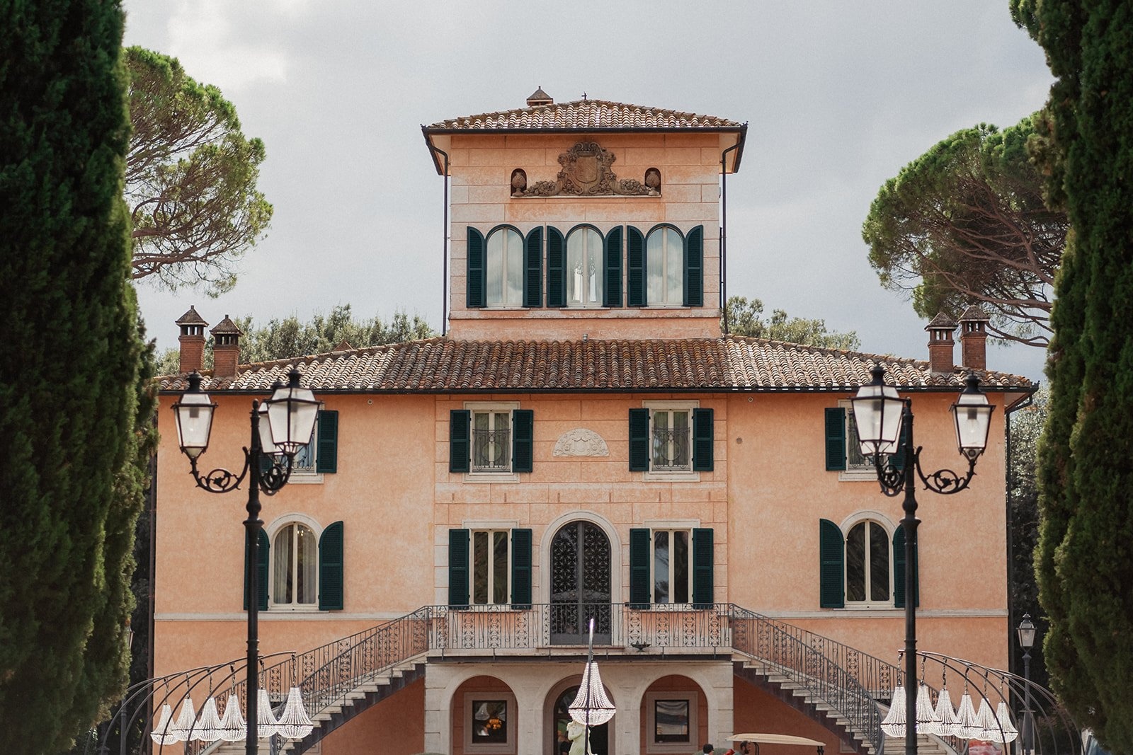 The pale terracotta facade of Villa Valentini Bonaparte, cypress-lined and shuttered, on the Tuscany/Umbria border, Your Secret Tuscany