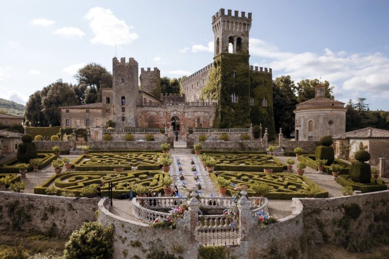 Castello di Celsa's crenellated towers above a geometric parterre garden, Siena, Your Secret Tuscany