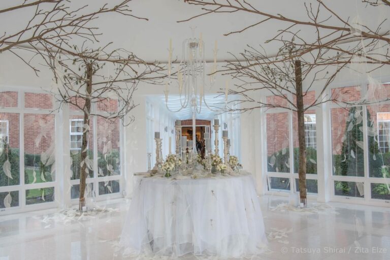 A winter reception, bare branches and candlelight, Zita Elze