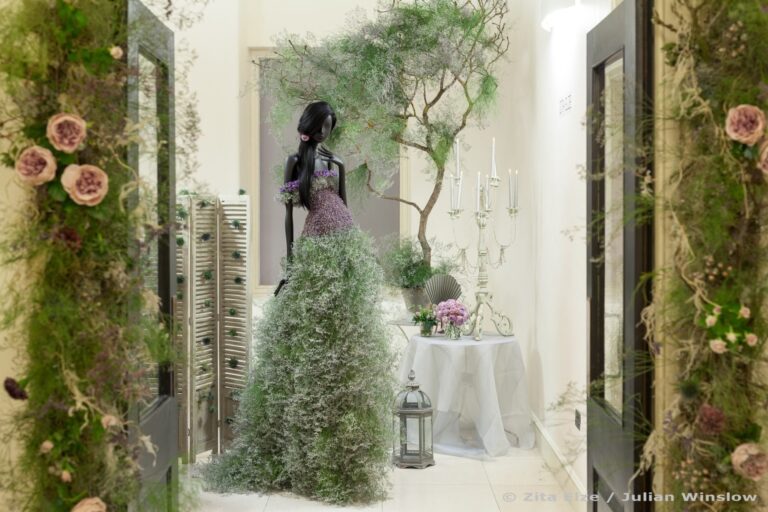 A Living Embroidery gown among branches and candlelight, Zita Elze